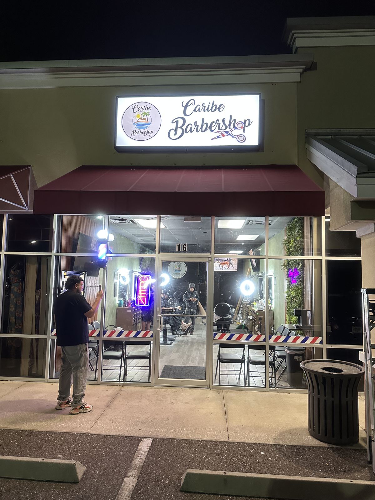 Caribe Barbershop illuminated sign installed